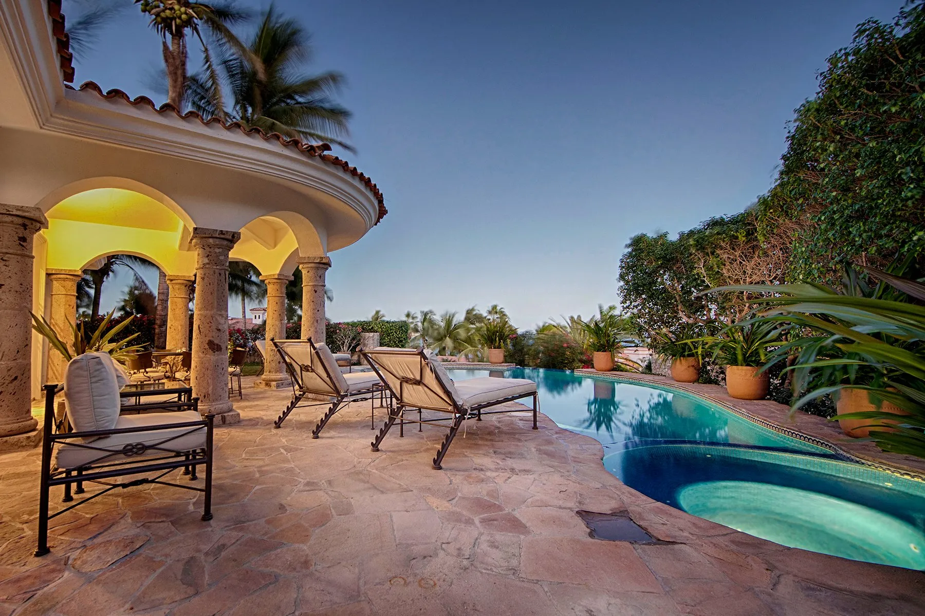 casa gloria pool terrace evening