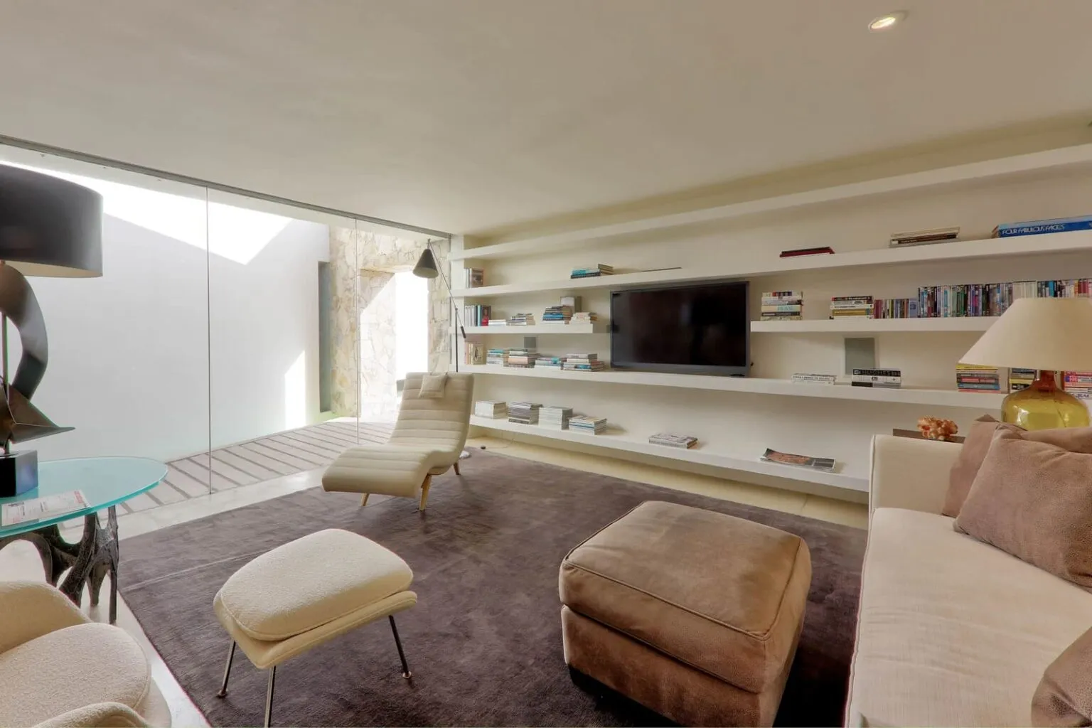 Modern media room and lounge at Casa Finisterra